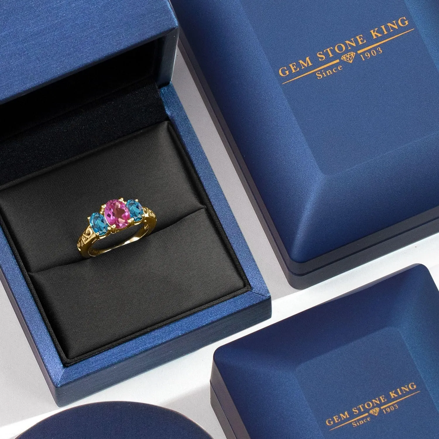 Gem Stone King 18K Yellow Gold Plated Silver Pink Mystic Topaz and London Blue Topaz Filigree Style 3 Stone Ring for Women (2.50 Cttw, Oval 8X6MM and 6X4MM, Available in Size 5, 6, 7, 8, 9)