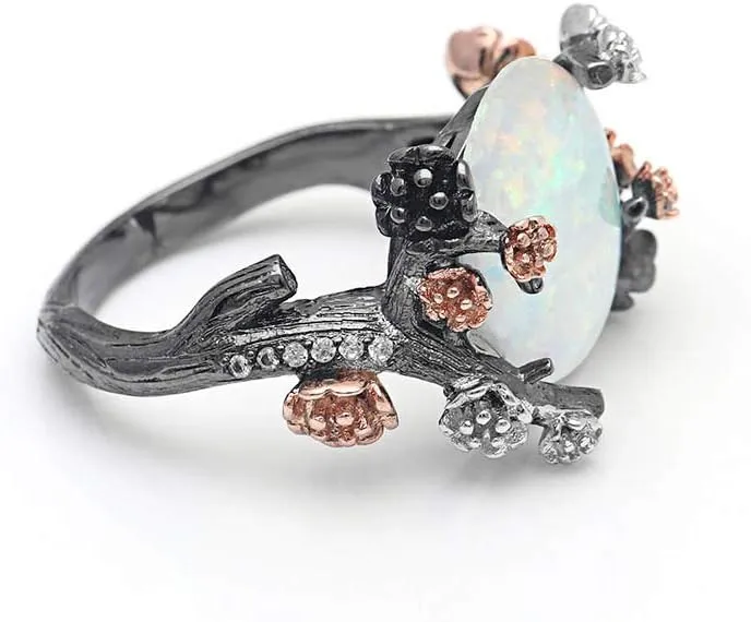 Henrietta Simulated Fire Opal Ring for Women by Ginger Lyne | Elven Gothic Black Plated for Engagement Promise or Statement -Tree Branch Flower Design Setting