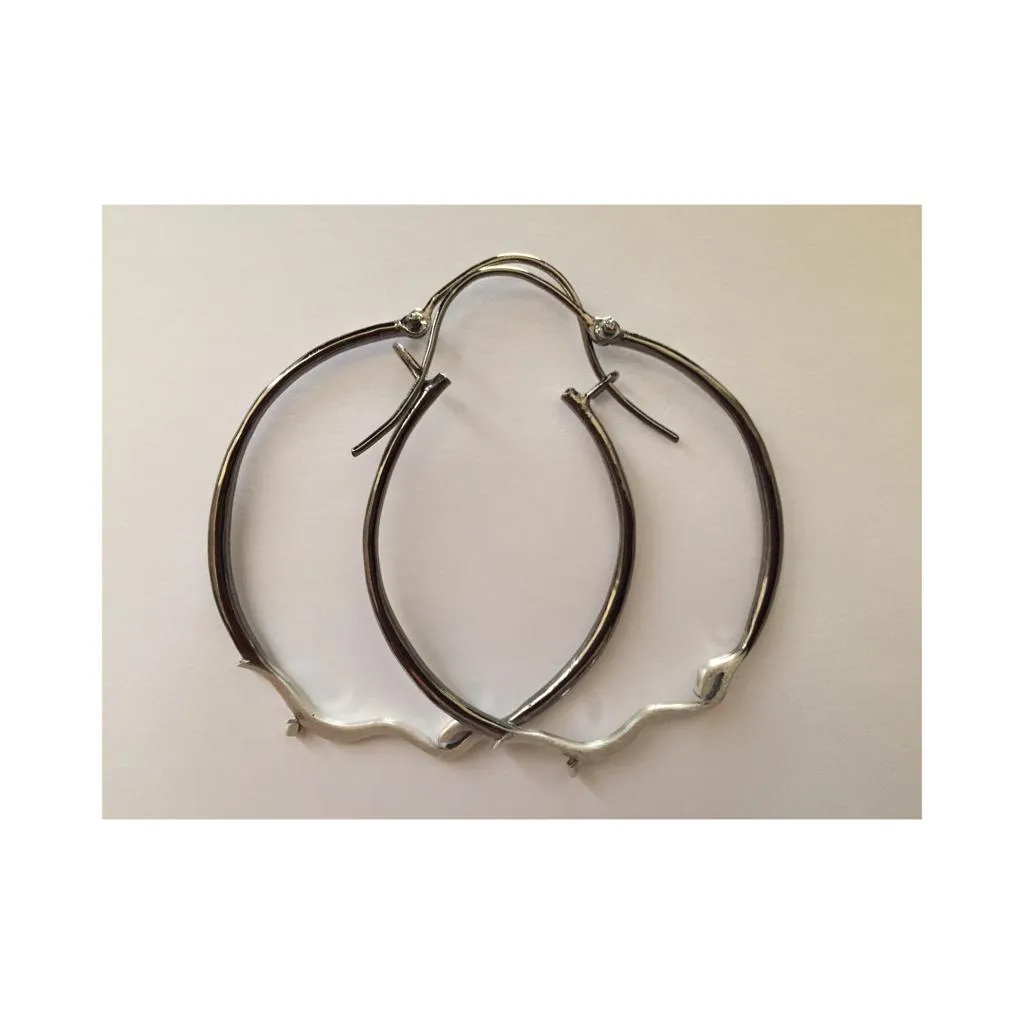 Hob Earrings by Ghada Hachem