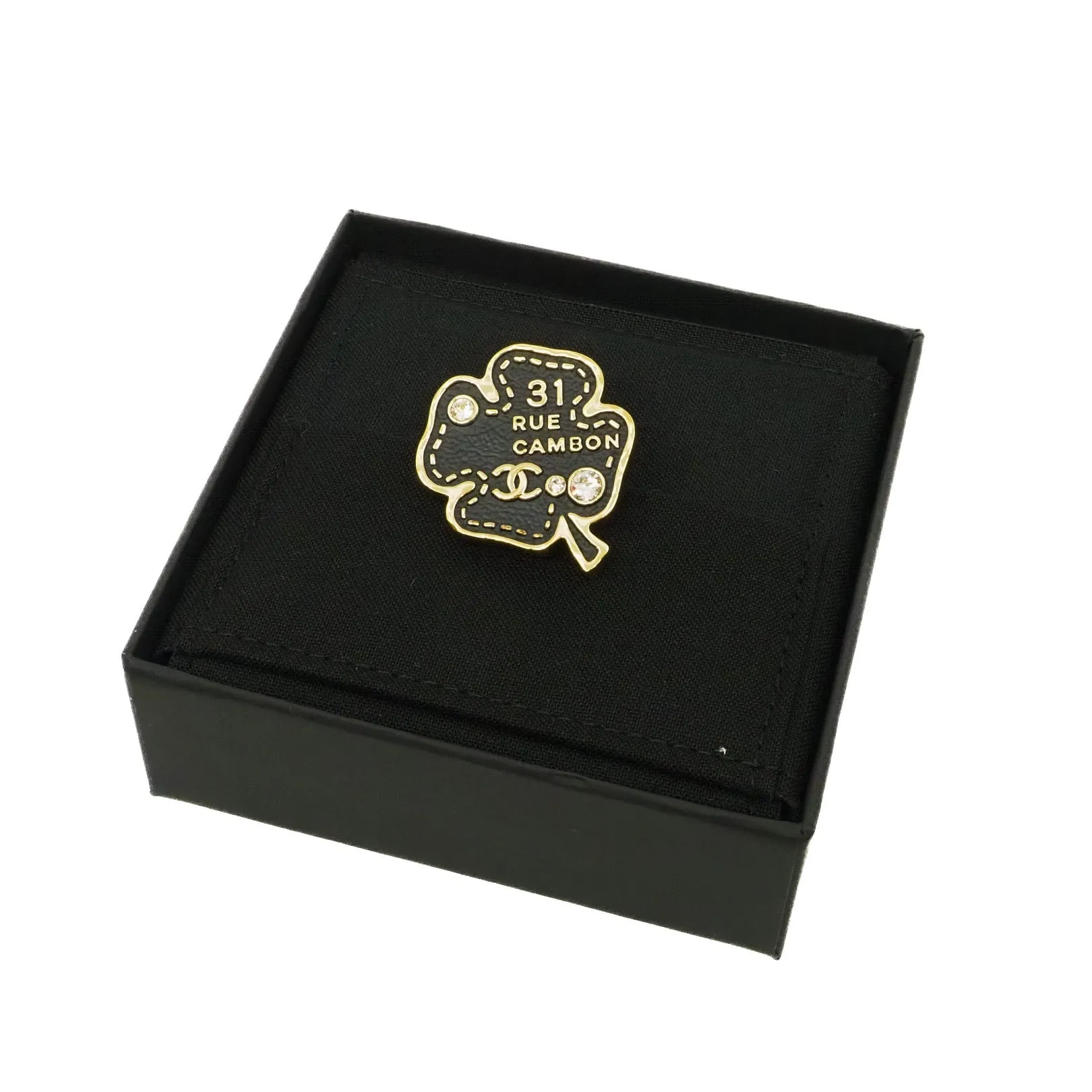 perfurm bottle brooch in leather black