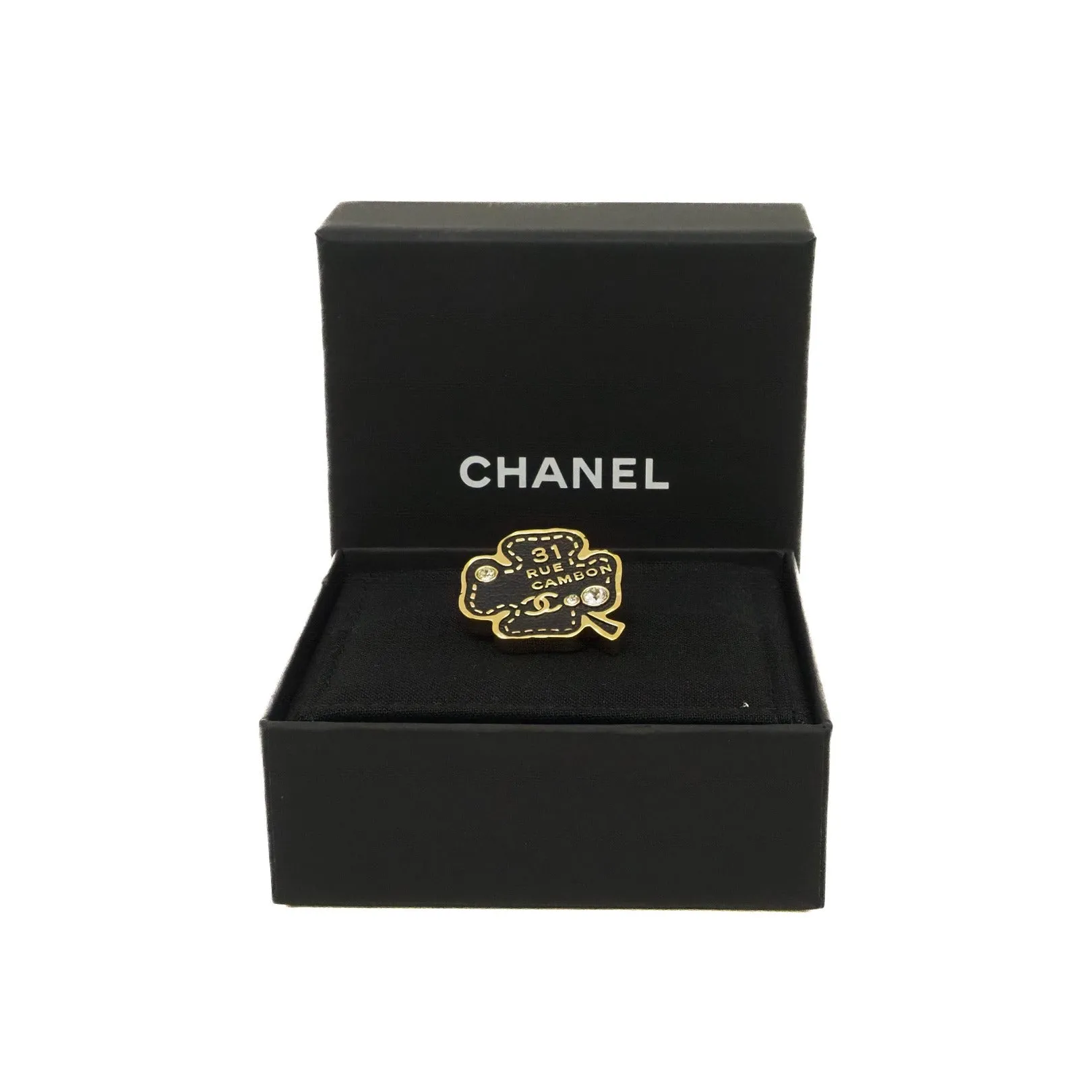 perfurm bottle brooch in leather black