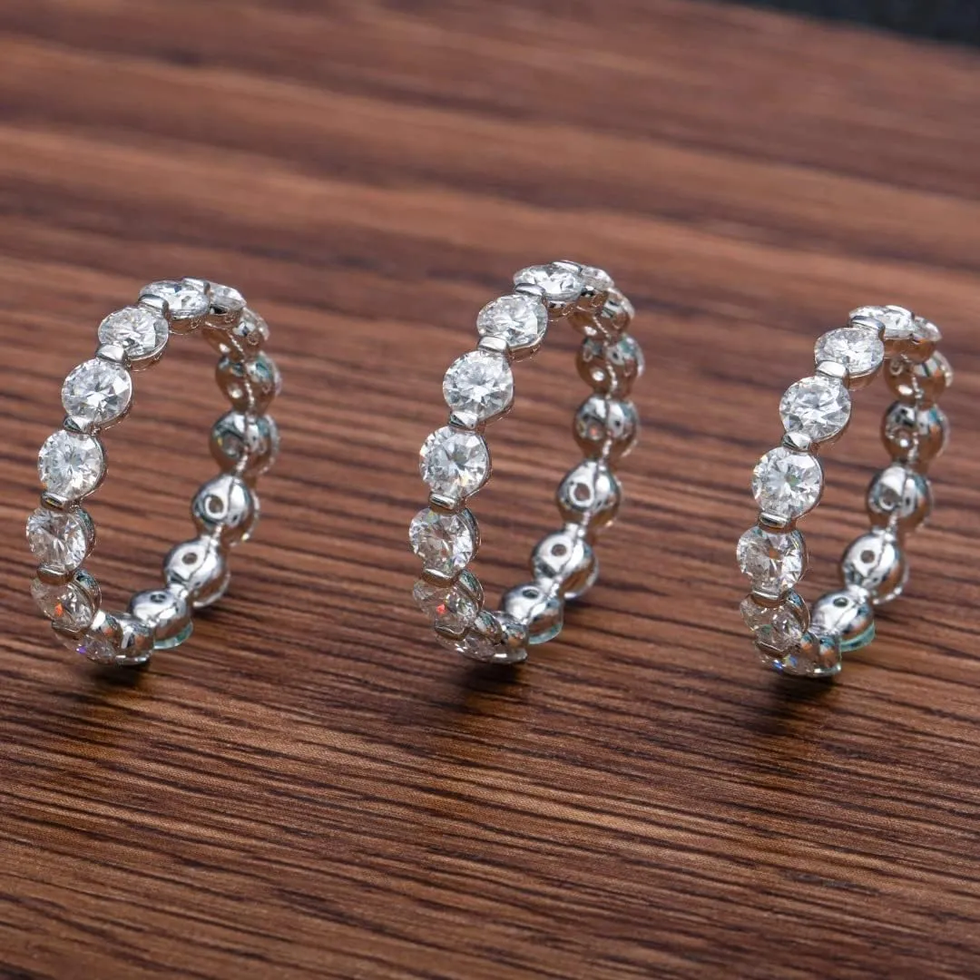 TwoBirch Platinum Plated Sterling Silver Round Cut Moissanite Eternity Ring (4 MM) (GRA CERTIFIED)
